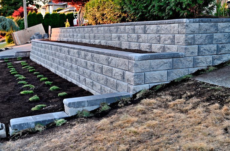 Concrete retaining wall built with cinder blocks