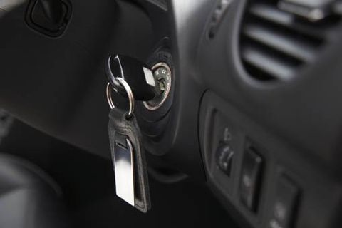inserting car key and starting engine  - Lock & Security in Ames, IA