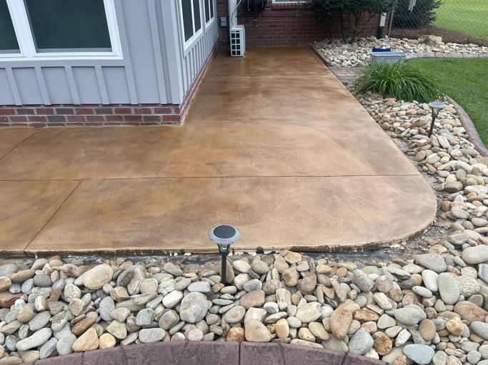 Flooring with Stones Beside It— Lexington, SC — Diamond Concrete Solutions