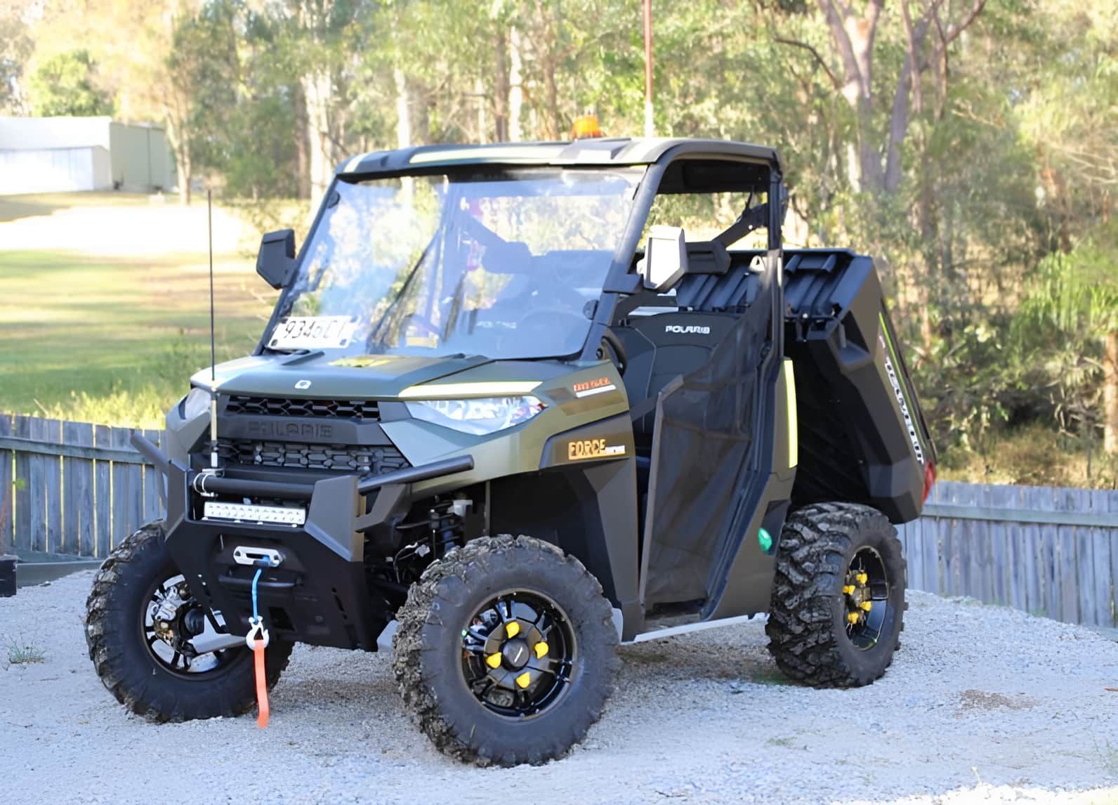 A Polaris Ranger 1000 Is Parked In A Gravel Lot — Forcequip Hire In Southside, QLD