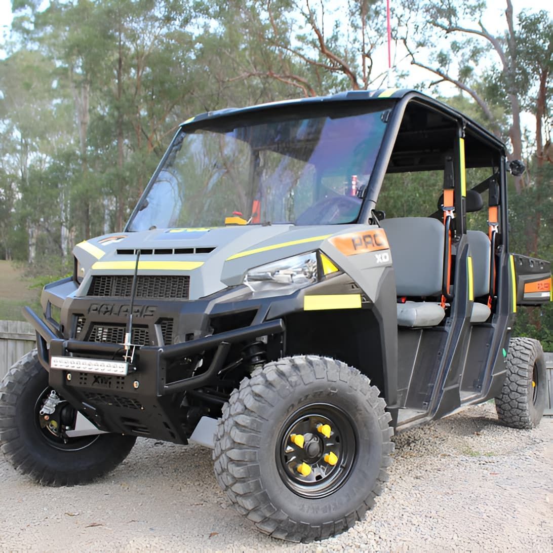 A Polaris Utility Vehicle Is Parked In A Gravel Lot  — Forcequip Hire In Southside, QLD