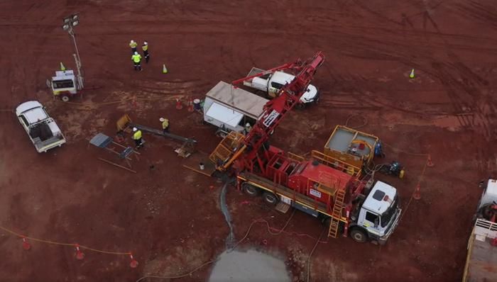 An aerial view of a construction site with trucks and workers — Forcequip Hire In Southside, QLD