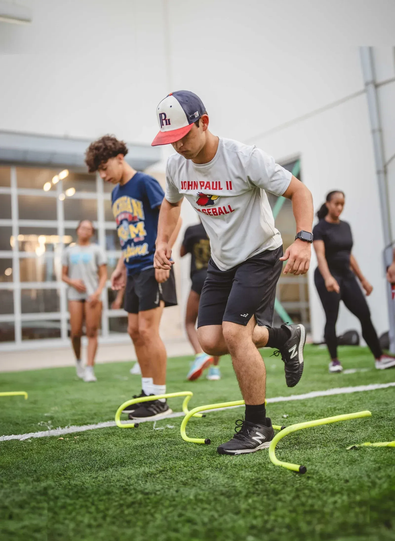 WeWon Smart Sport Solutions logo representing U.S. sports performance, education, and technology-driven training