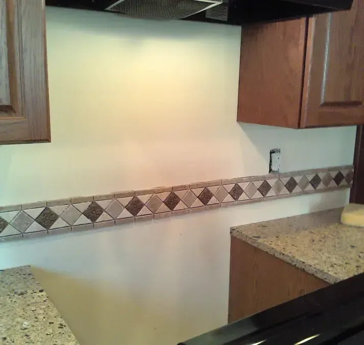 A kitchen with wooden cabinets and a stove top oven