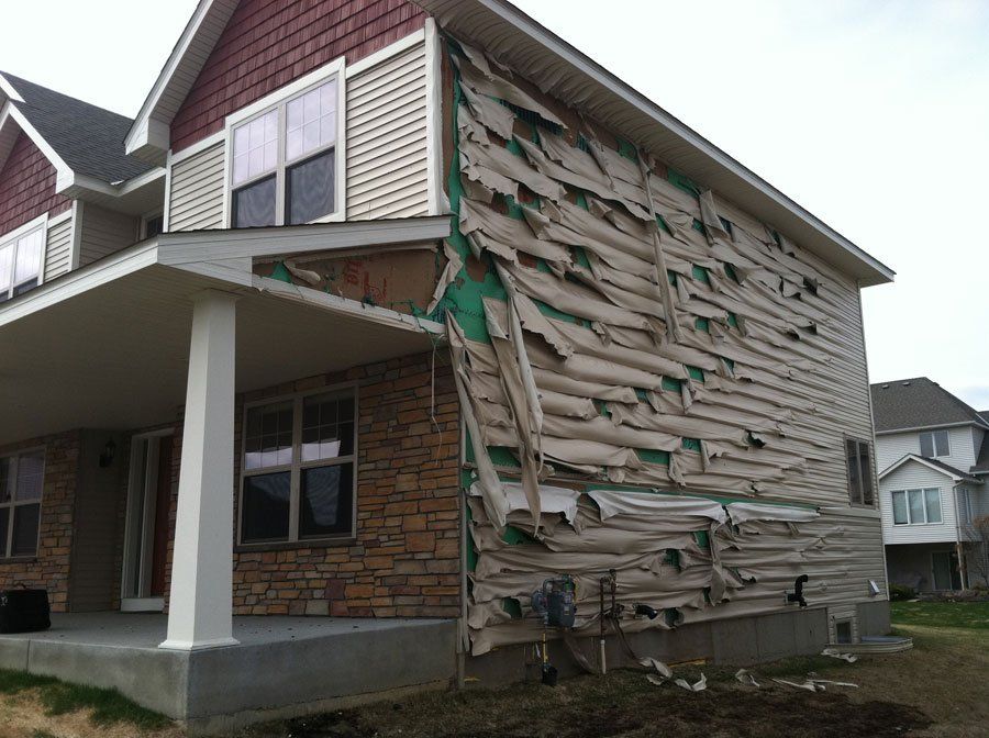 Siding Fire Damage Project Before — Fairbault, MN — Bauer Restoration Inc