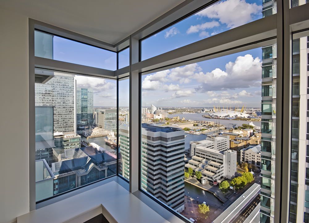 A Large Window With A View Of A City — K & S Windows In Ciccone, NT