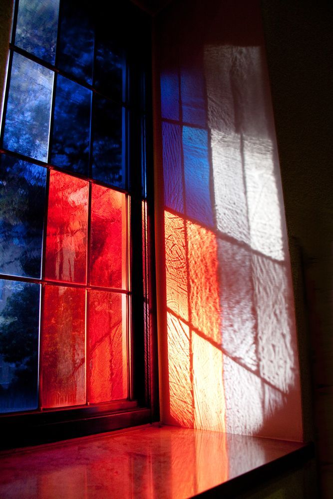 The Sun Is Shining Through A Stained Glass Window — K & S Windows In Ciccone, NT