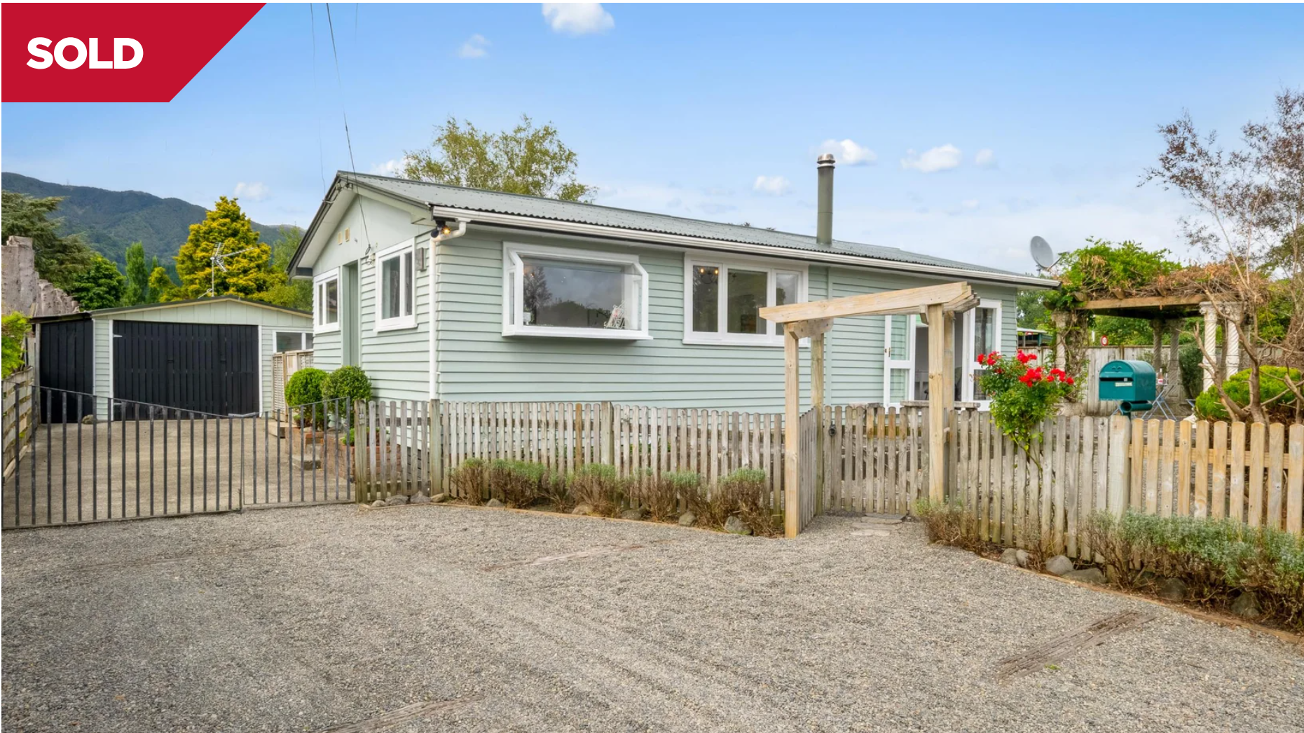 A picture of a house that has been sold