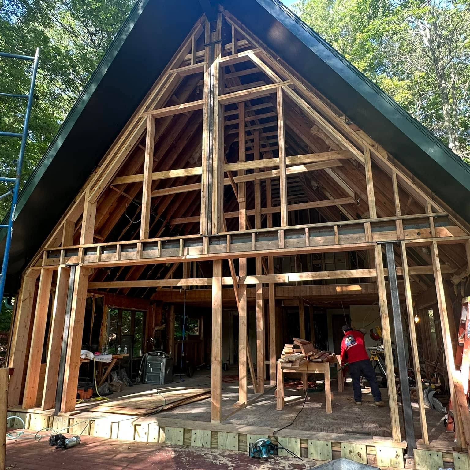 A house that is being built with a green roof