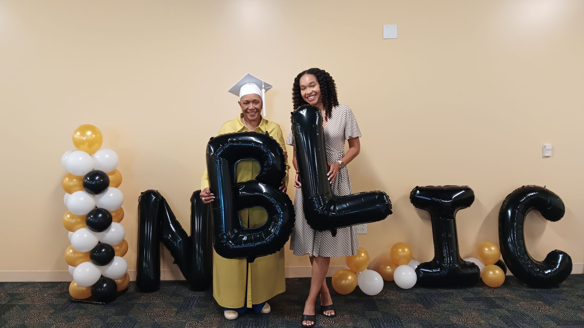 Two women posing with 