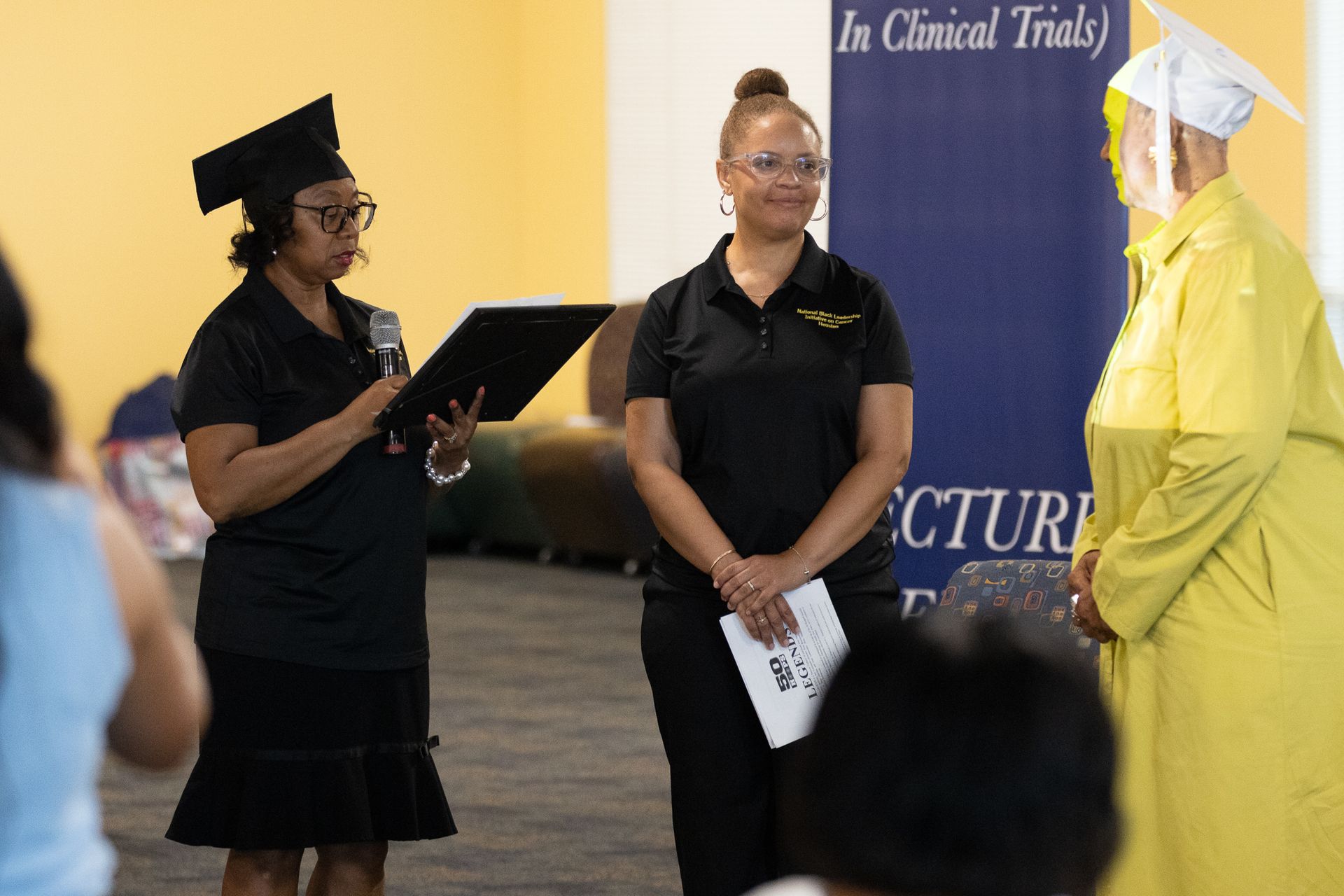 Three people at an event