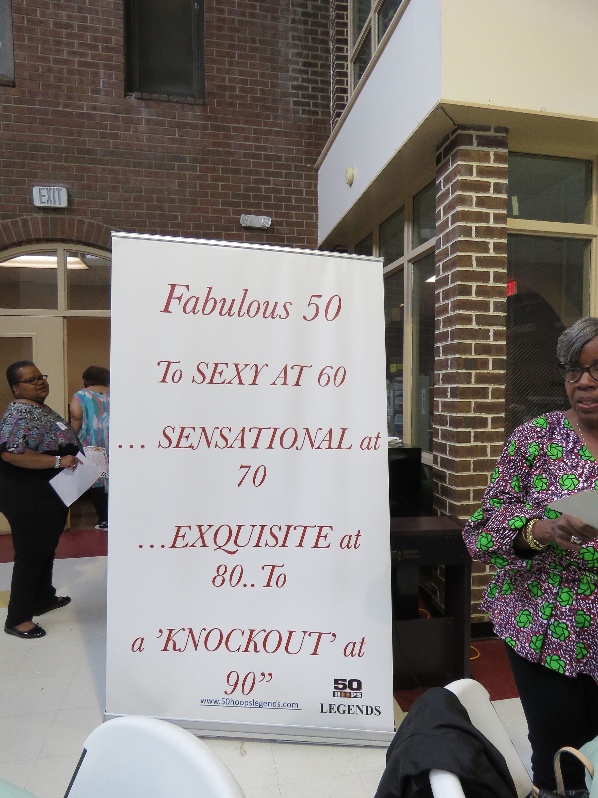 A sign lists age-related adjectives, 