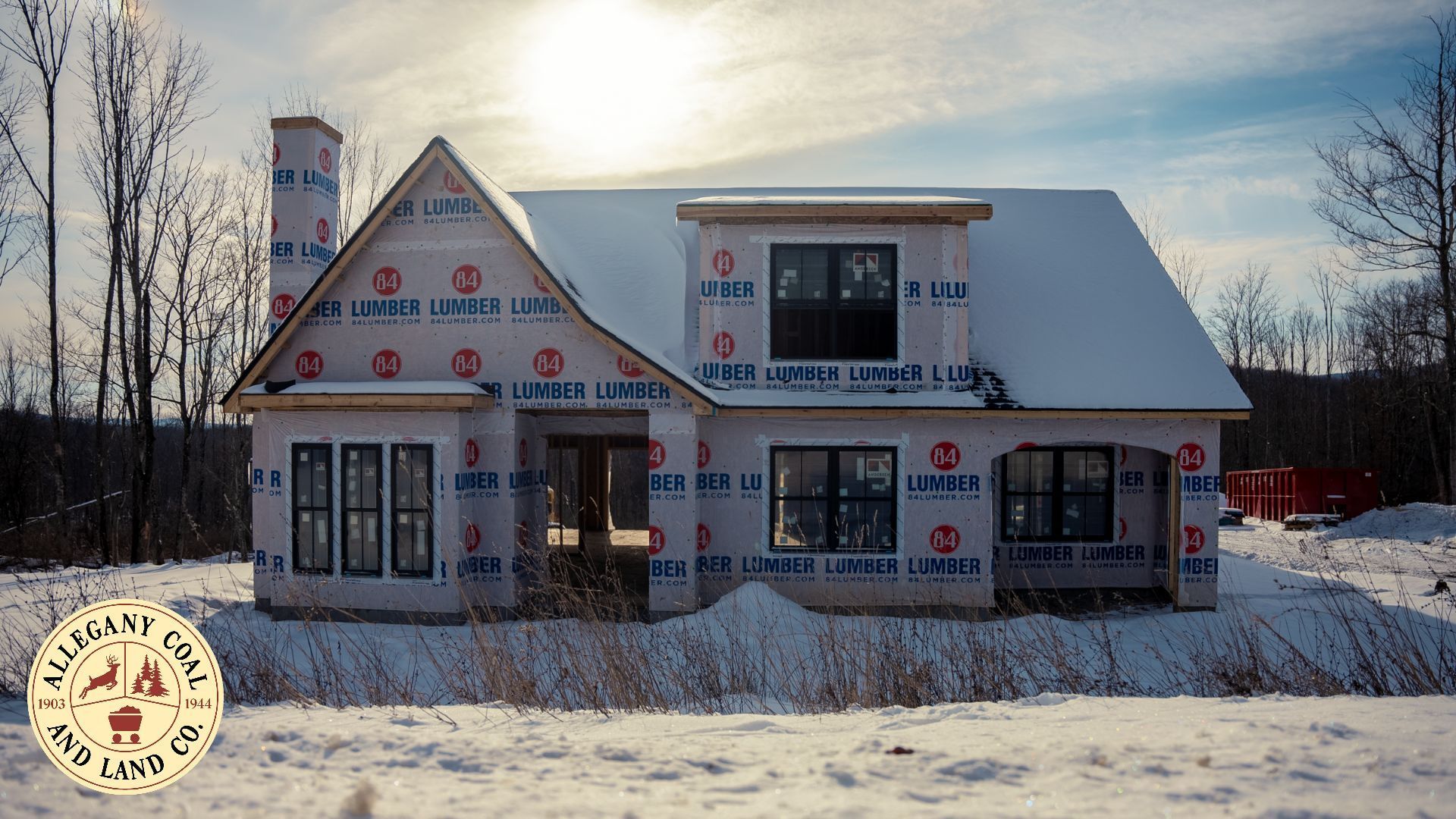 A house that is being built in the snow