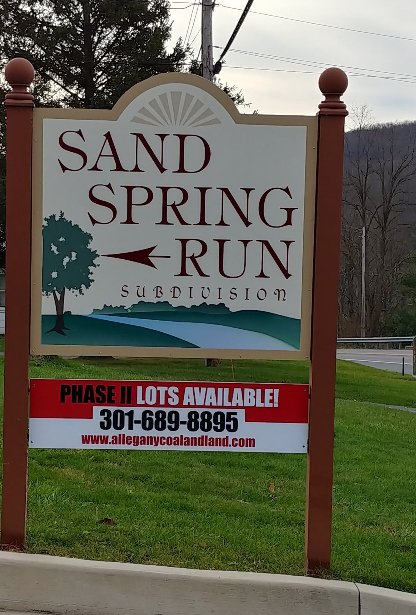 A house is being built in the snow with a sign that says farm