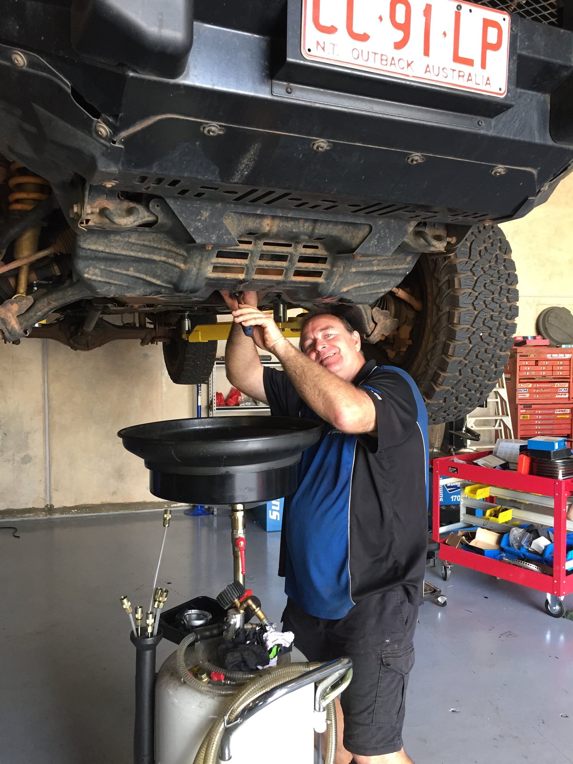 Mechanic Changing Oil — Mechanic in Berrimah, NT