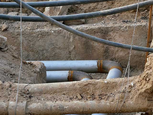 Excavation pit from non-destructive vacuum truck