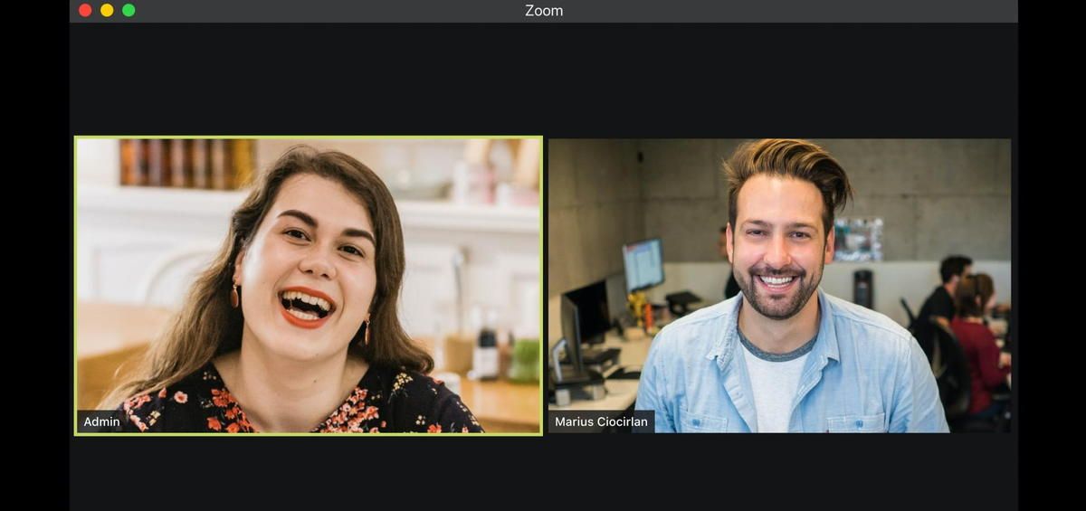 A man and a woman are having a video call on a computer screen.