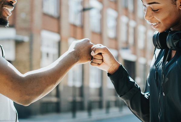 Woman and Man have fistbump