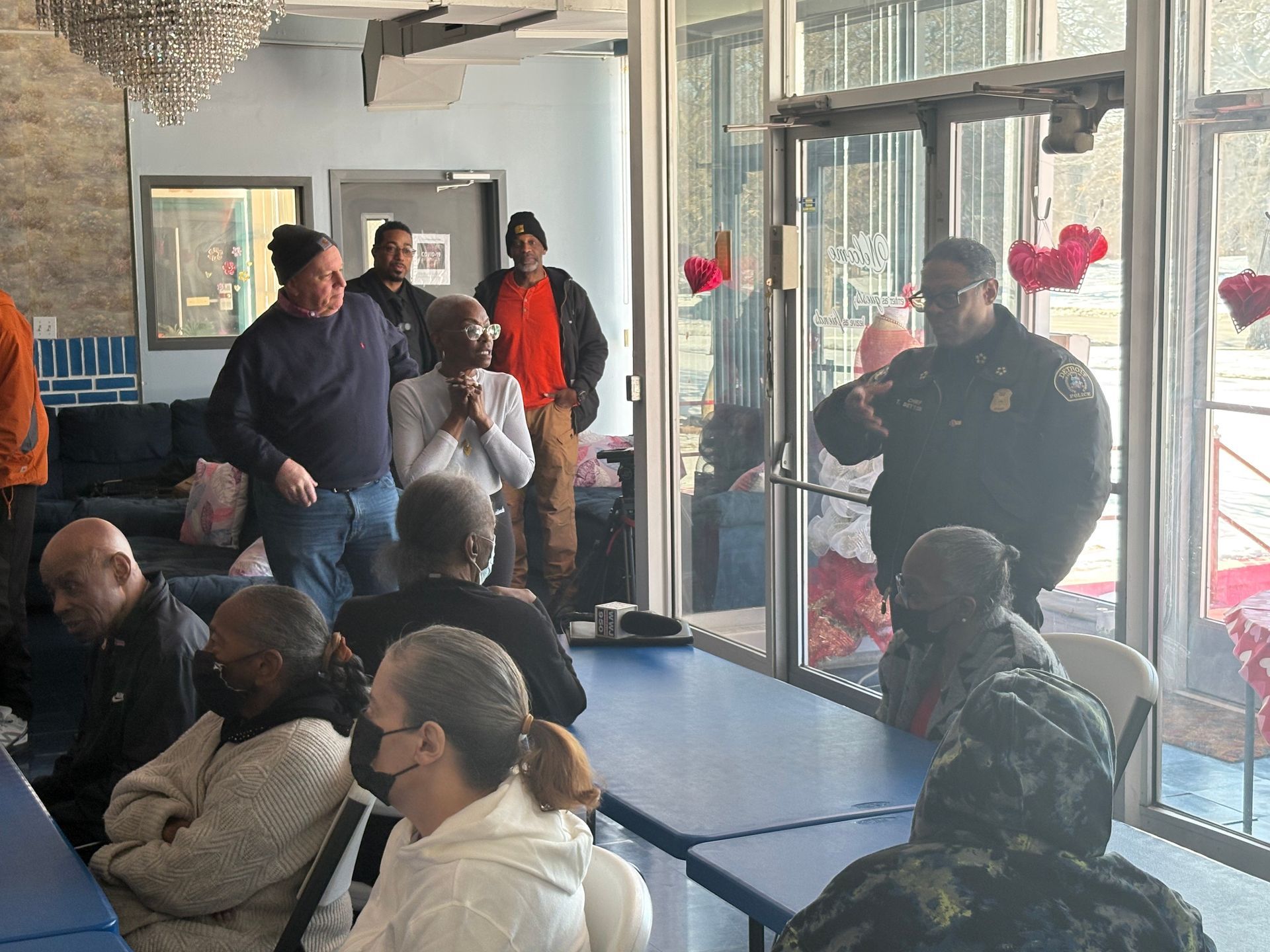 female nurse helping senior