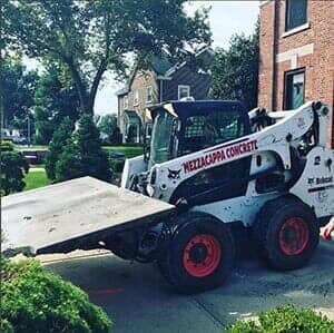 The Workers and the Asphalting Machines — Masonry Services in Staten Island, NY