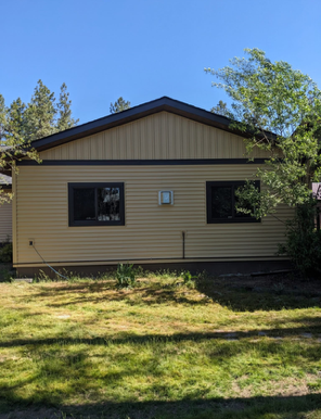 New vinyl siding project that we just completed in Suncrest. Back of House View