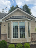 beige siding bump out