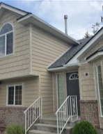 beige siding front door