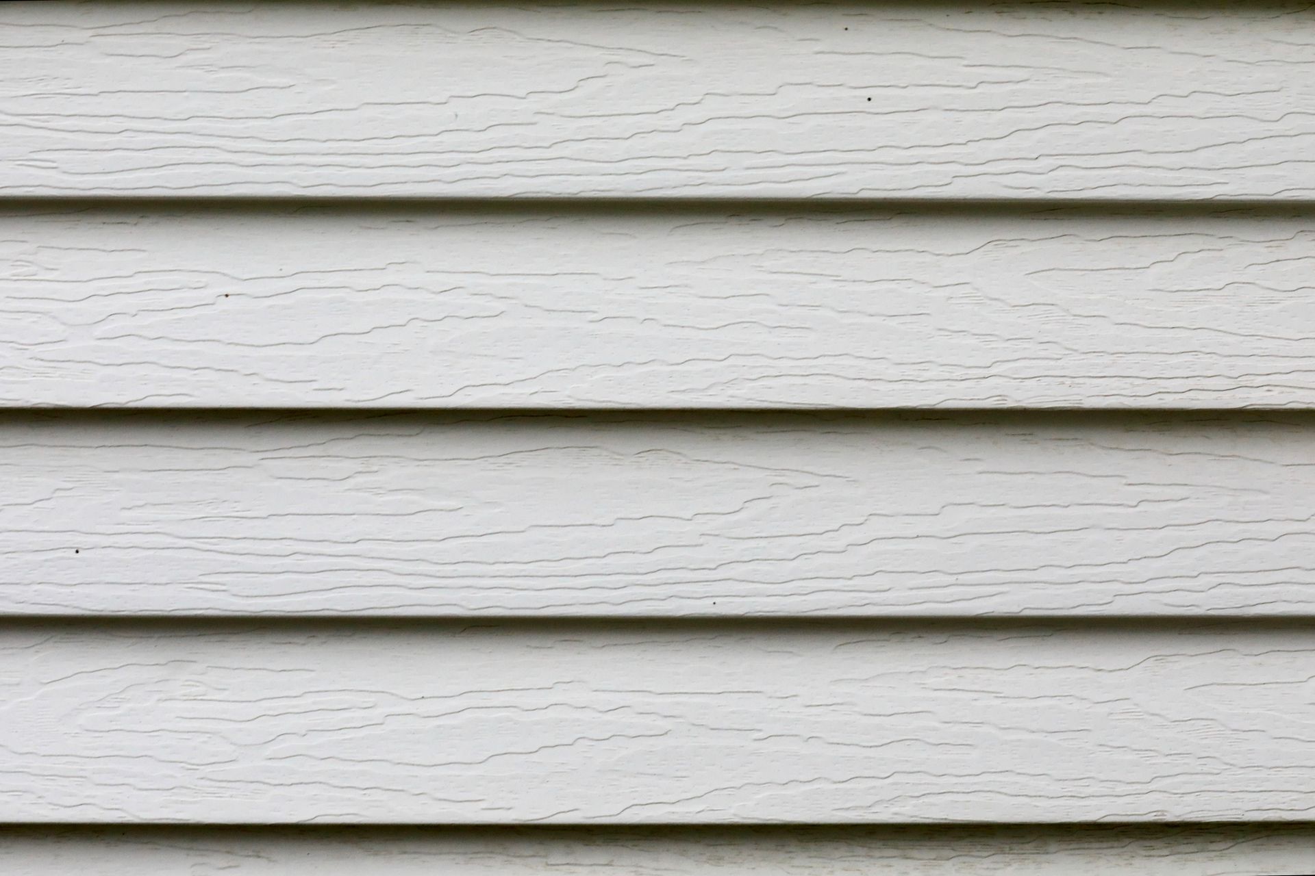 Textured aluminum siding.