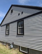 A recently completed Mastic vinyl siding job on the South Hill in the Grand Boulevard area - side of house