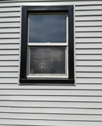 A recently completed Mastic vinyl siding job on the South Hill in the Grand Boulevard area - side of house