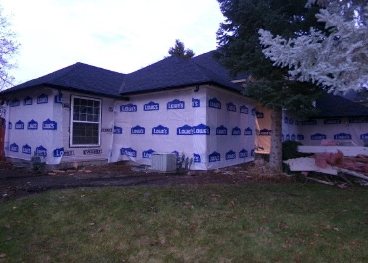 4” Carvedwood Vinyl Siding in white, in progress