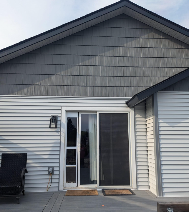 The back of a house with a sliding glass door