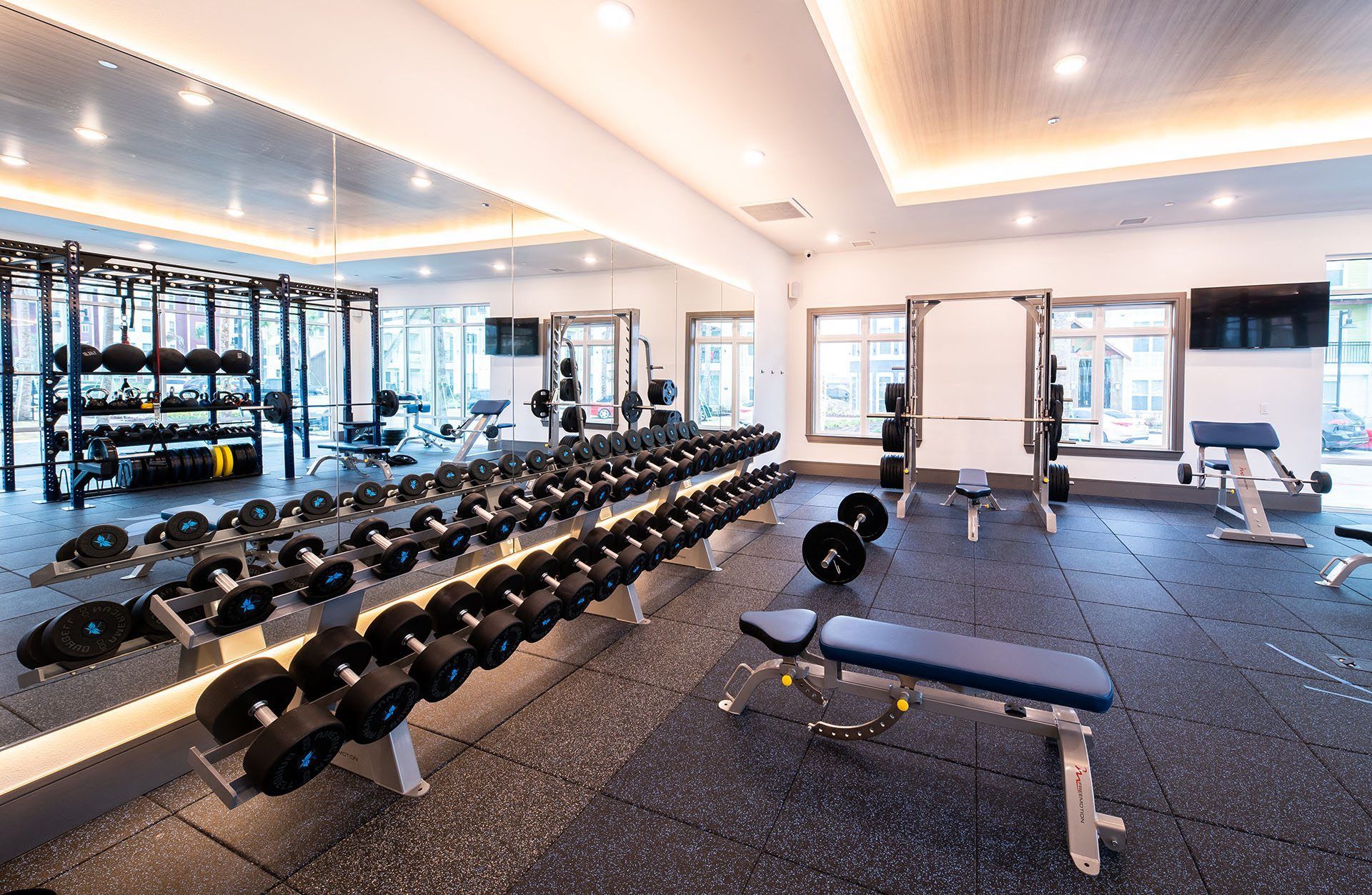 Lewisville Apartments for Rent - Hebron 121 Station - Spacious Fitness Center With Dumbbells and Bench Press Station