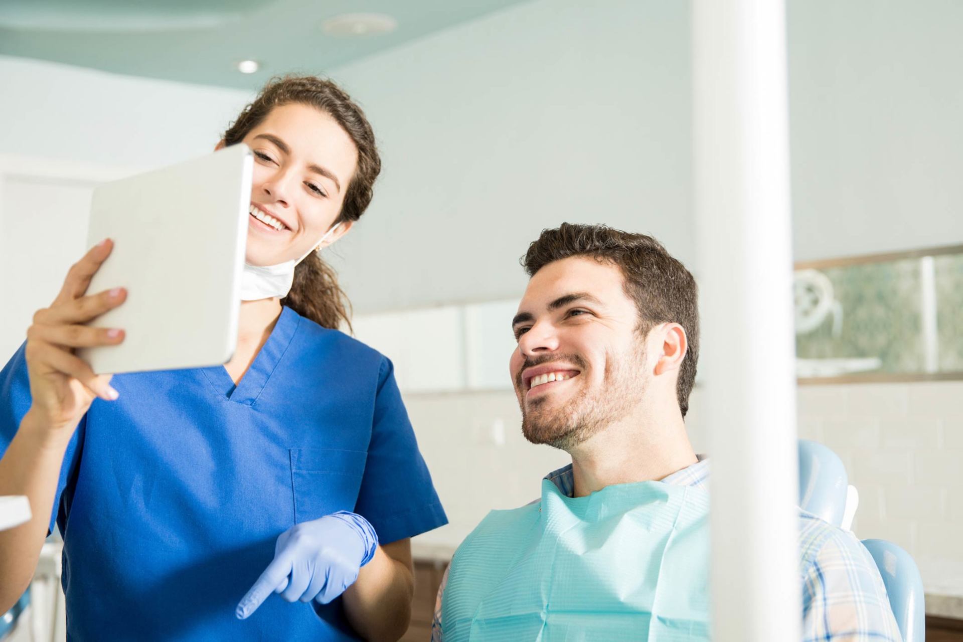 Smiling Dentist and Patient — Duluth, MN — Lake Superior Endodontics