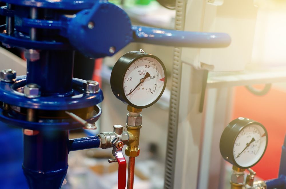 Blue Industrial Pipes With Pressure Gauges — Hills 2 Ocean Plumbing in Maclean, NSW