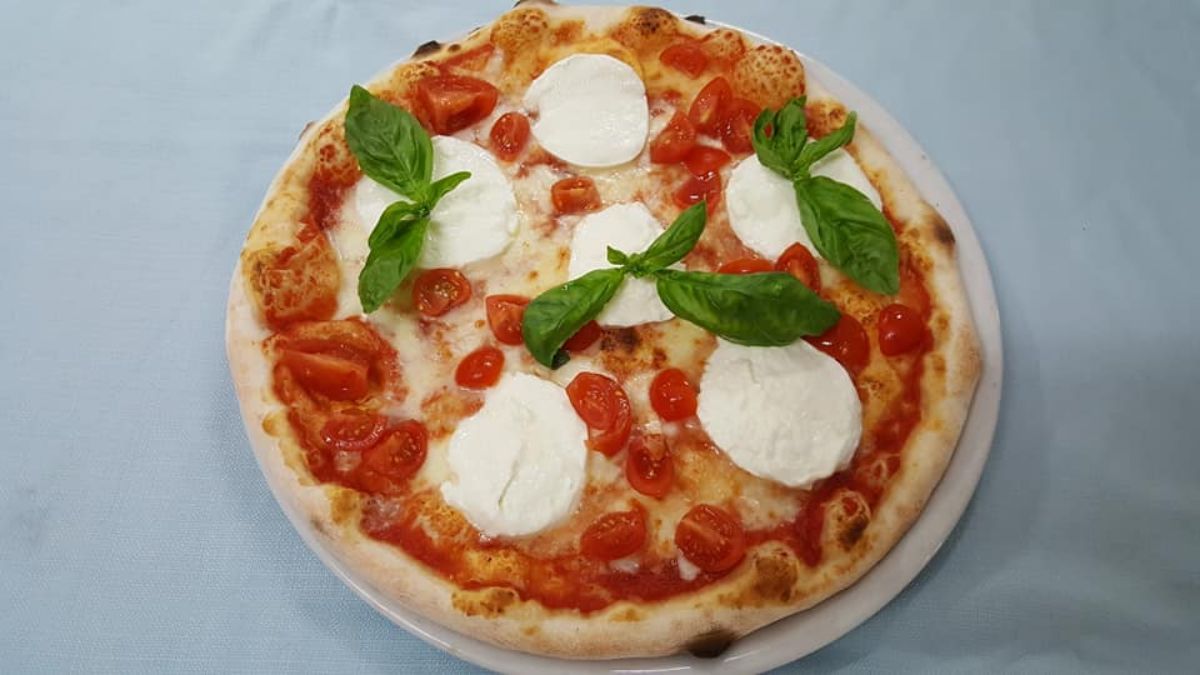 Pizza con pomodorini