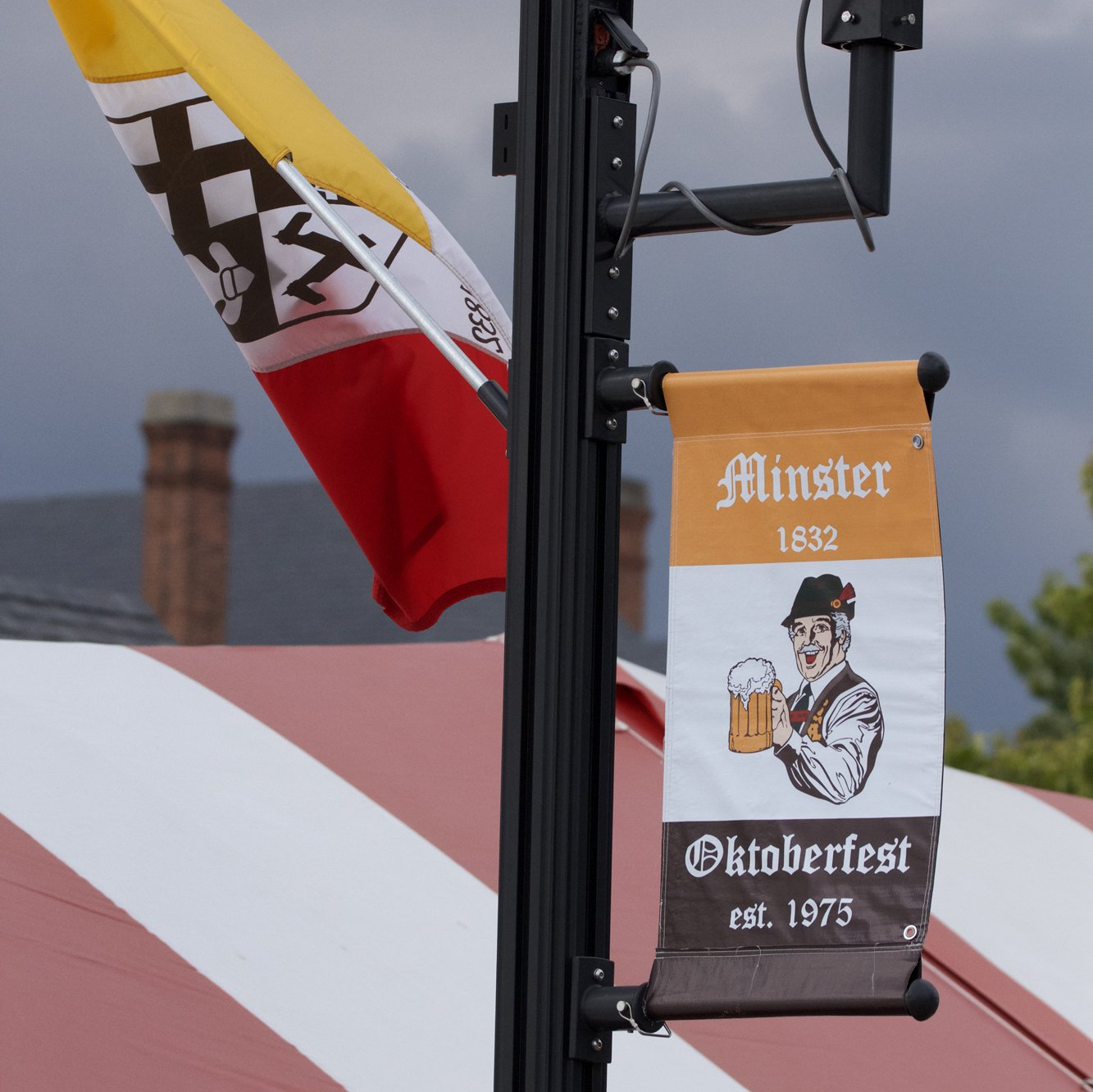 A flag and a banner for Minster Oktoberfest.
