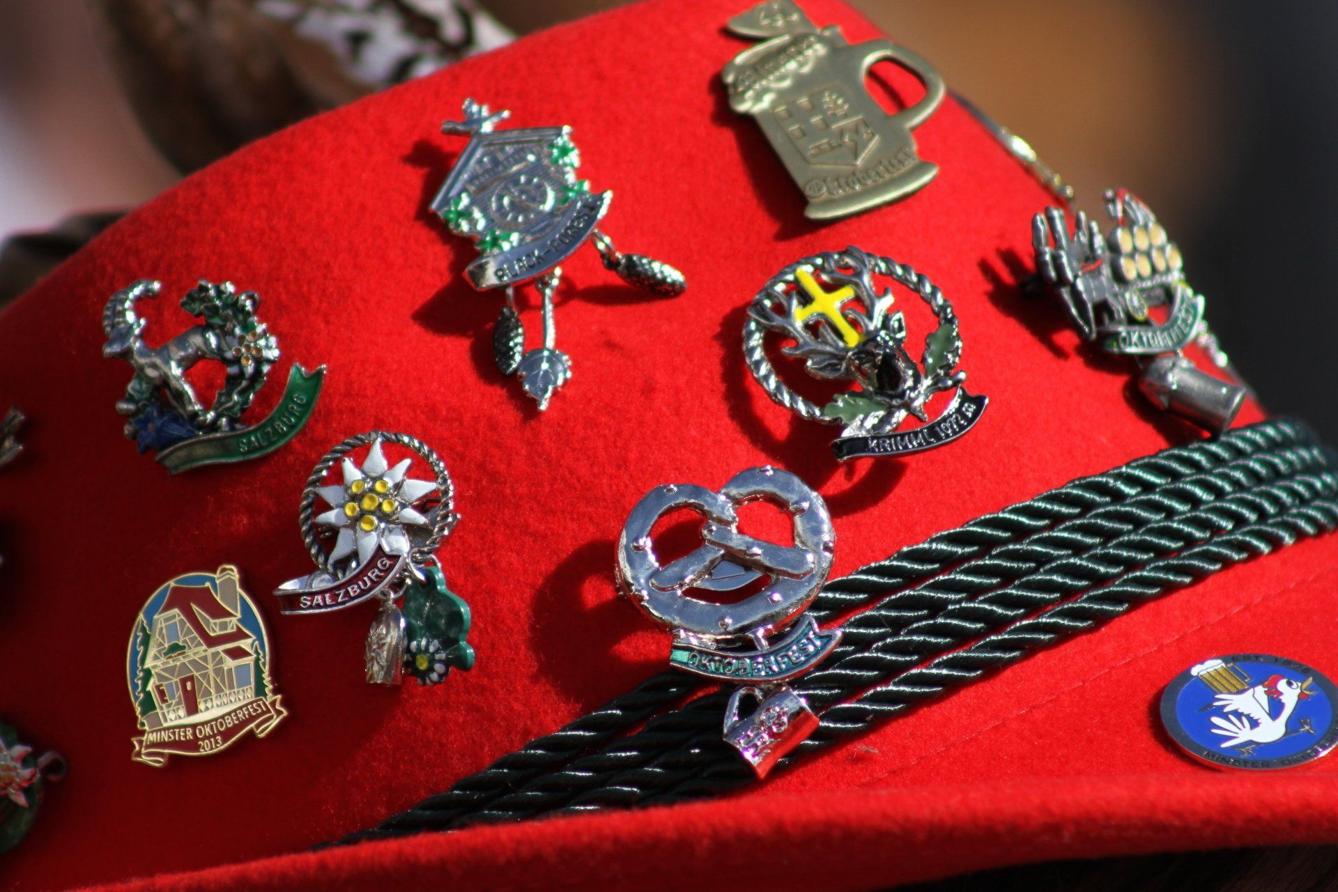 Multiple pins on a hat.