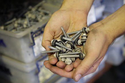 Bolts and nuts in hand | Rockhampton Hardware Store QLD