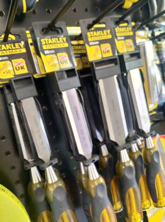 Stanley products hang in display rack | Rockhampton Hardware Stored