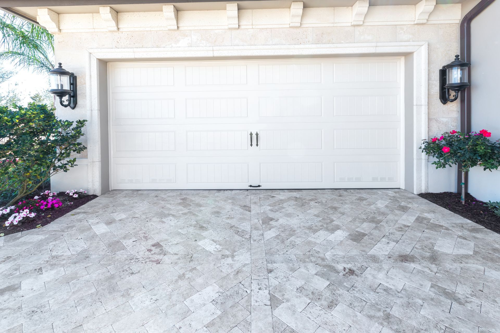 New suburban home with modern double garage door installed by a professional garage door company.