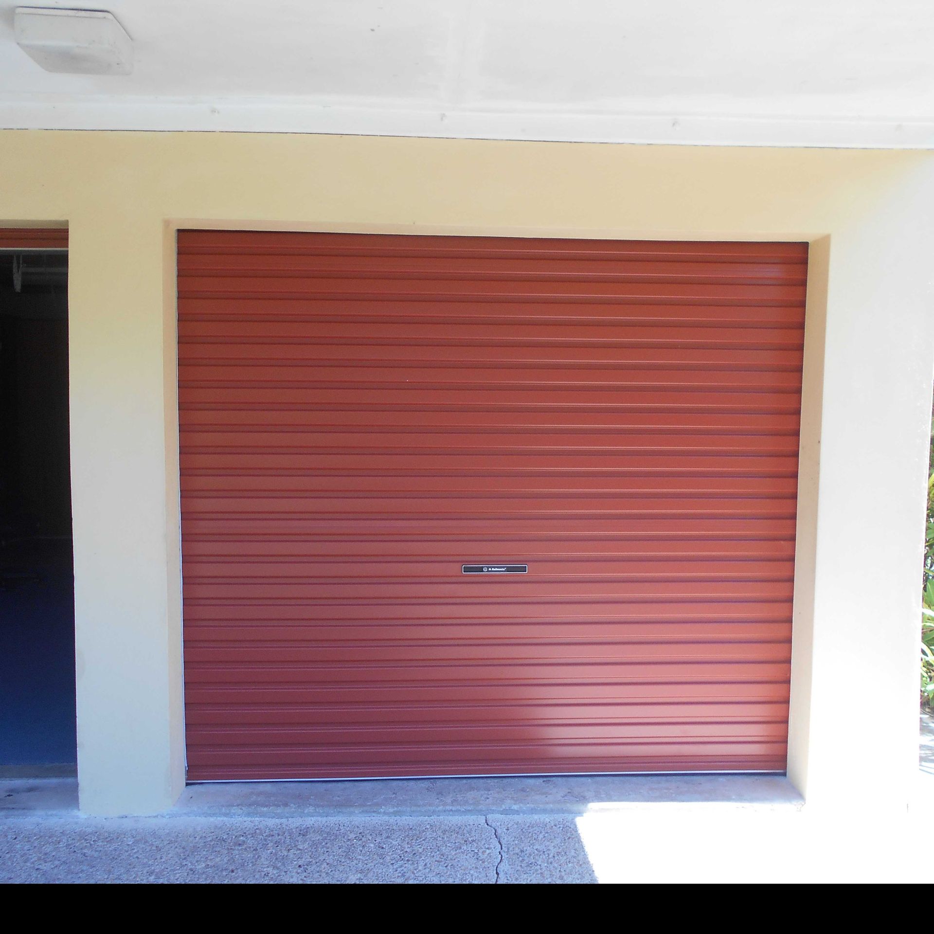 House Garage Door — Noosaville, QLD — Noosa Door Centre