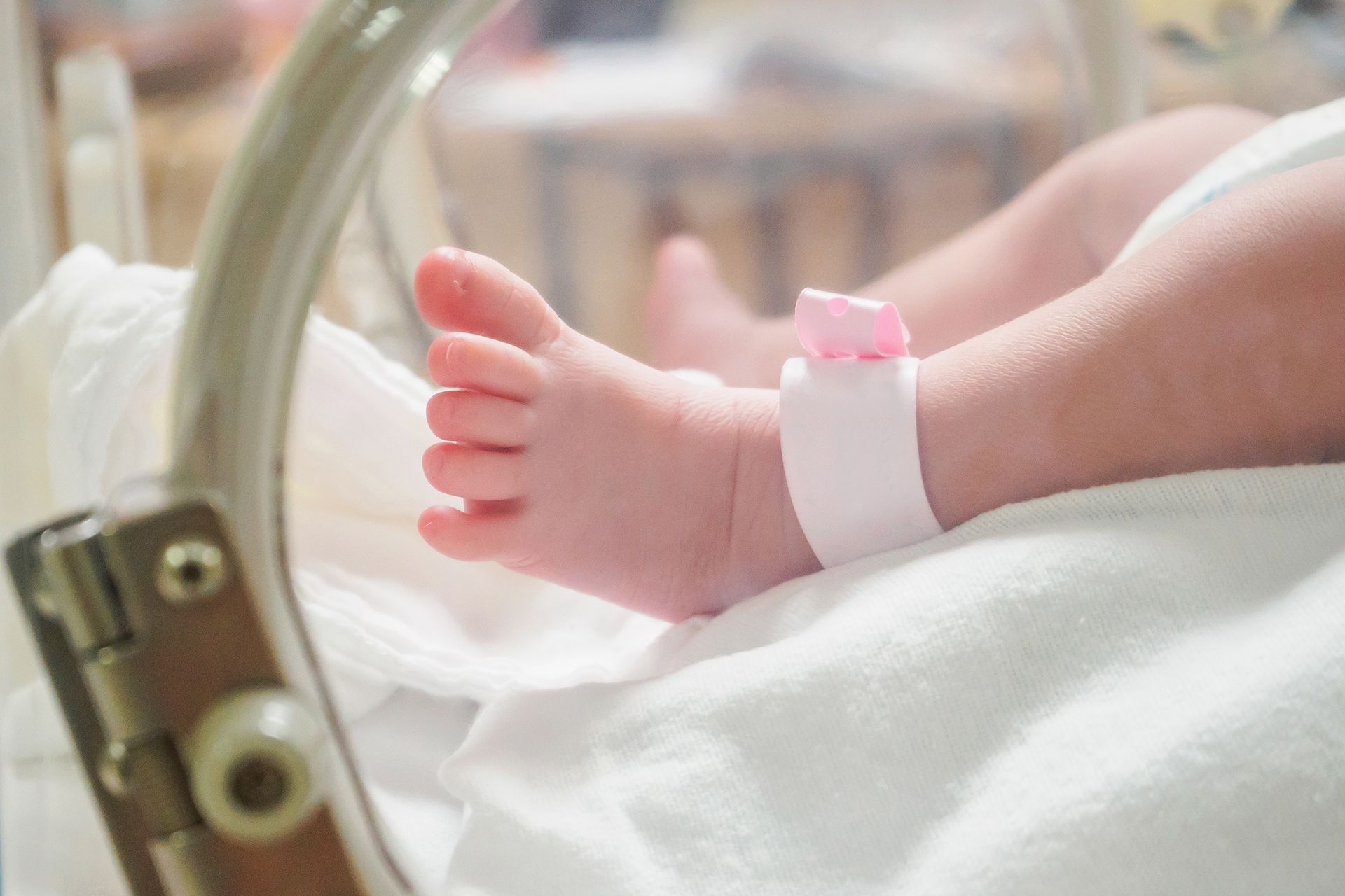 A close up of a baby 's foot in an incubator.Friends of Alfie Martin
