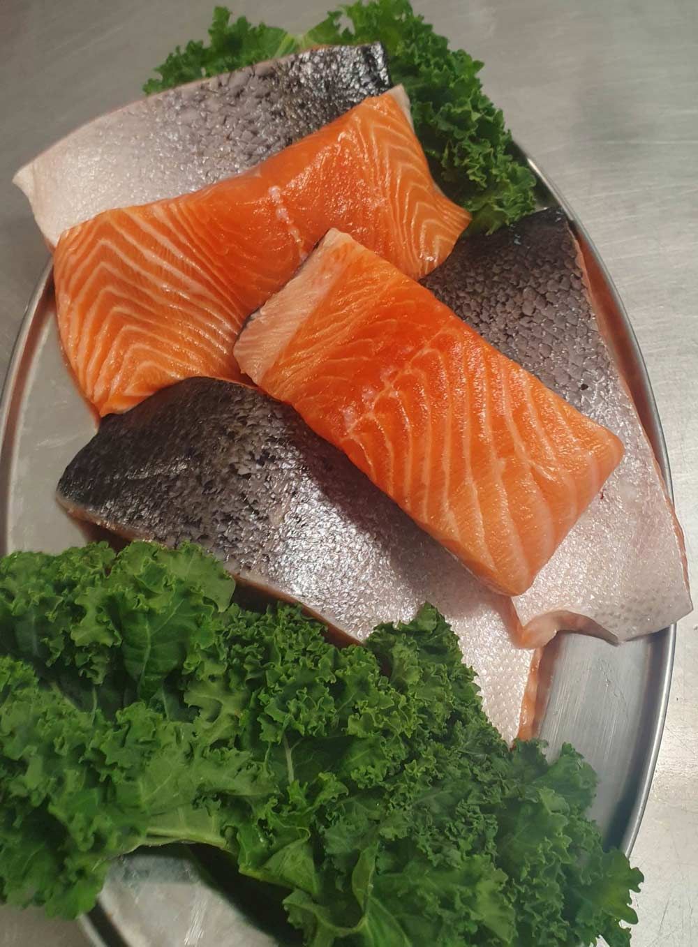 Atlantic Salmon served with veggie and lemon— Seafood Wholesale in Portsmith, QLD