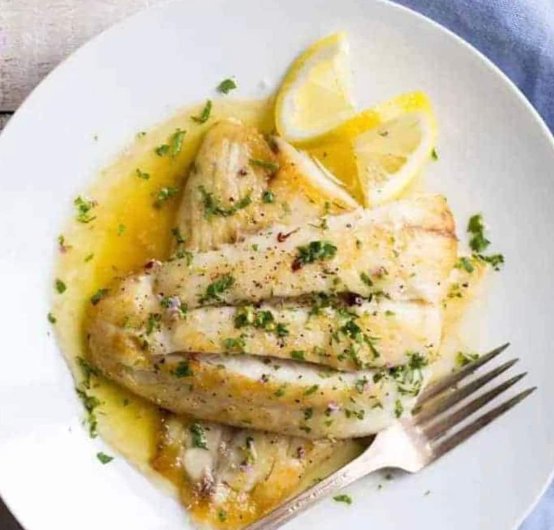 Baked Barramundi and a fork — Seafood Platter in Portsmith, QLD