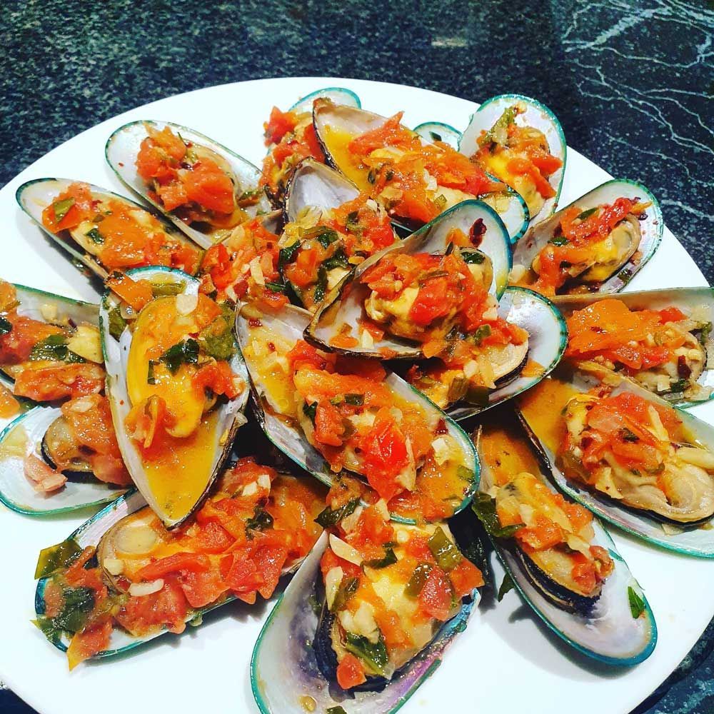 Mussel With Bruschetta Served on a White Plate — Local Seafood Shop in Portsmith, QLD