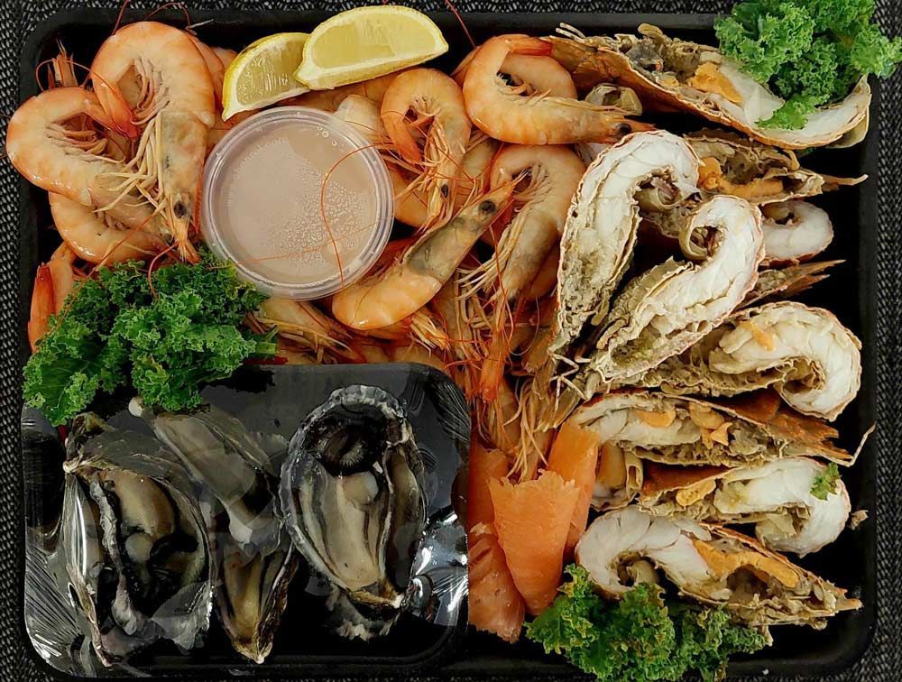 Mouth Watering Seafood with dipping and lemon — Seafood Platter in Portsmith, QLD