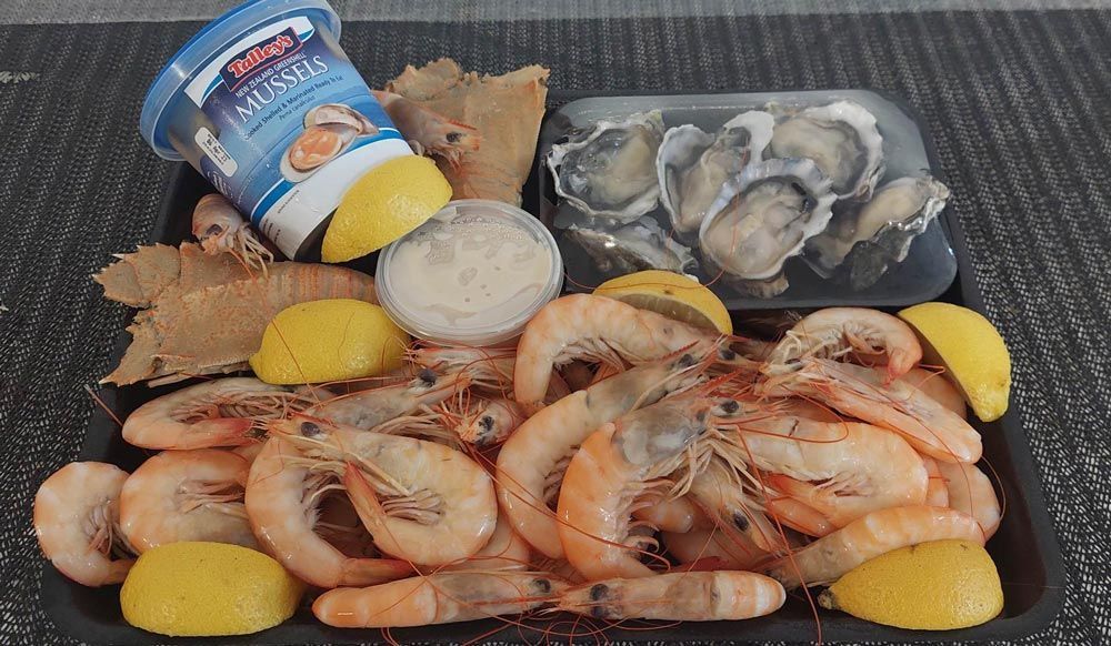 Mussels And Prawns with a packaging box— Seafood Platter in Portsmith, QLD