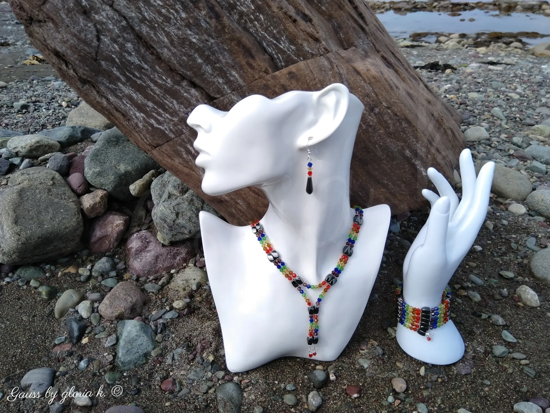 Fruit Cocktail magnetic wrap necklace and bracelet on rocky coastline