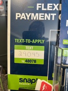 A sign that says text to apply on it